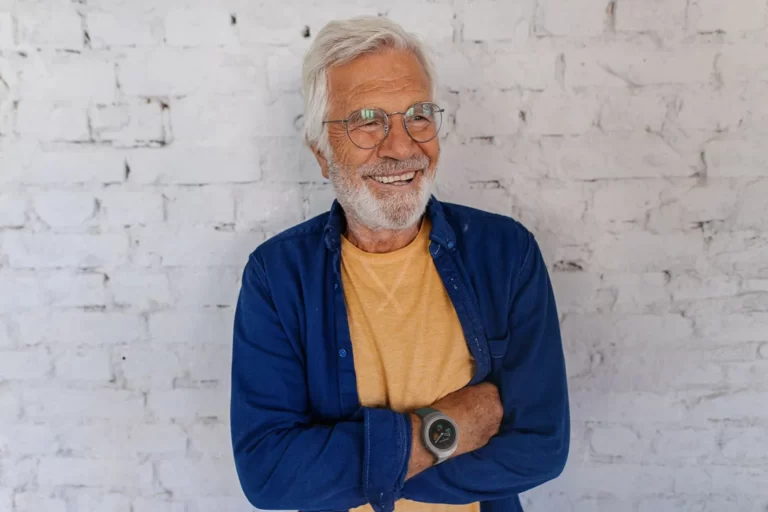 Man facing the camera smiling wearing a Spacetalk Life smart watch